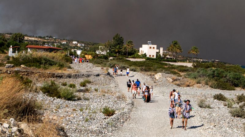 Rhodes wildfires: Tourists flee in Greece’s largest-ever evacuation